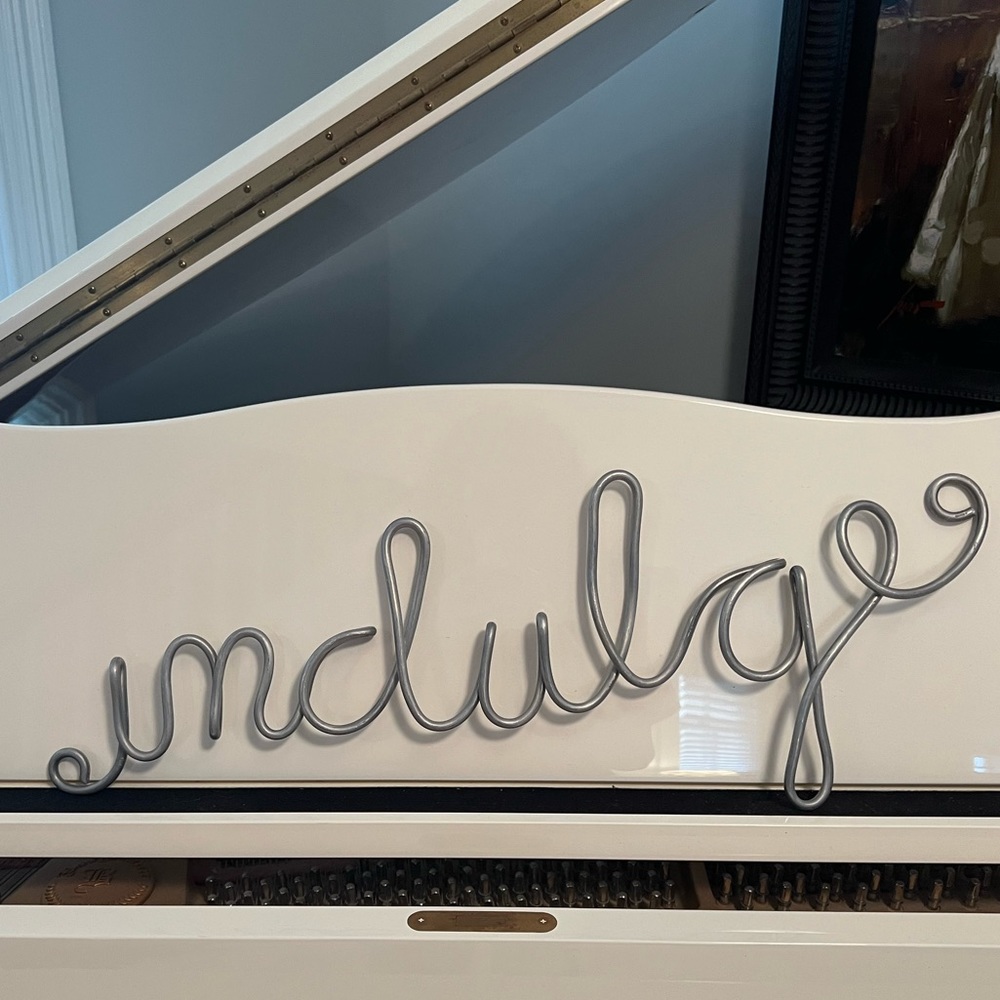 Indulge metal sign